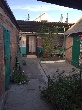 г.Азов, По ул. Ленина: кирп. дом о/п 63, 4 комн., газ, эл., вода, ванна, туалет в доме, летняя кухня, гараж, хоз. постр., уч. 6 сот 14